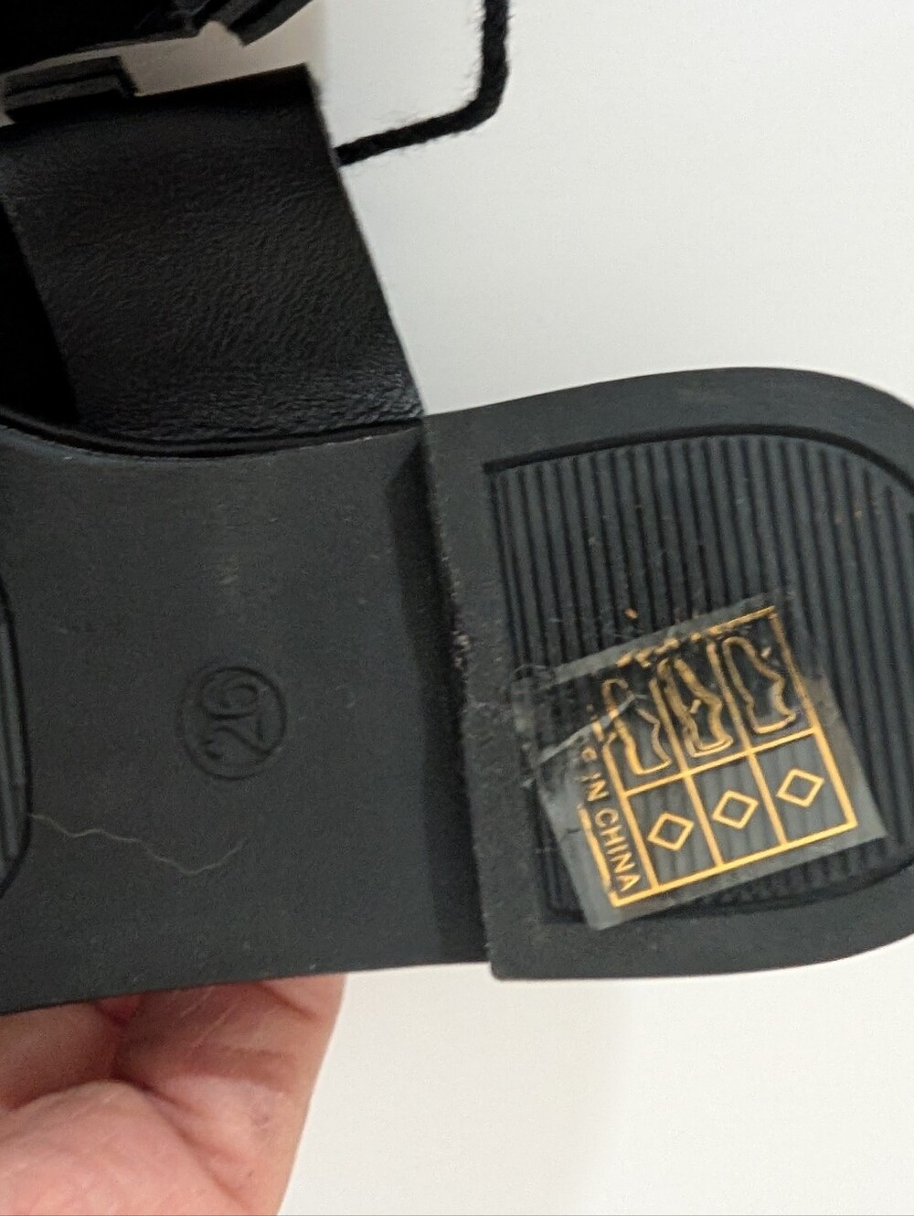 Girls Black Thong Sandals with Gold Medallion Accent - Picture 3 of 4